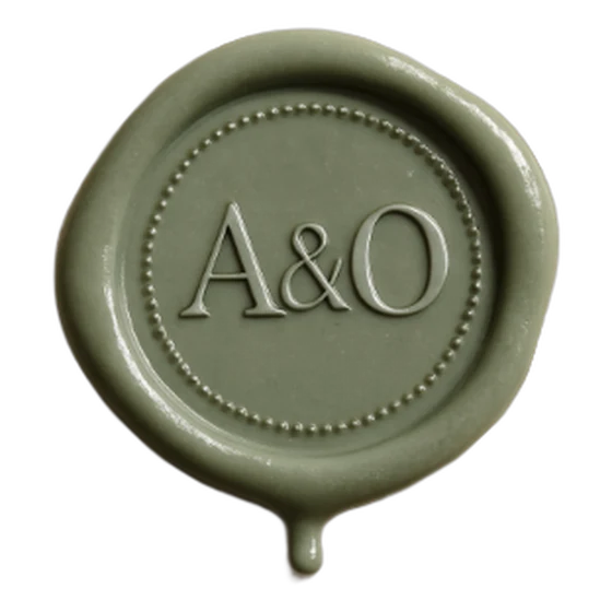A sage green wax seal with the initials A & O, designed in the Seal Studio